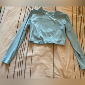 Blue crop long sleeve workout top